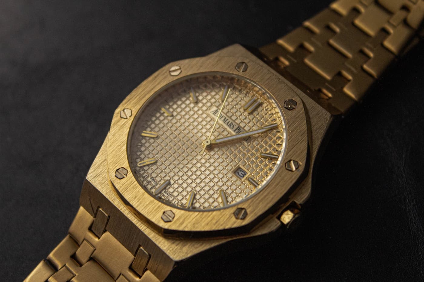 Audemars Piguet Royal Oak in yellow gold with champagne tapisserie dial