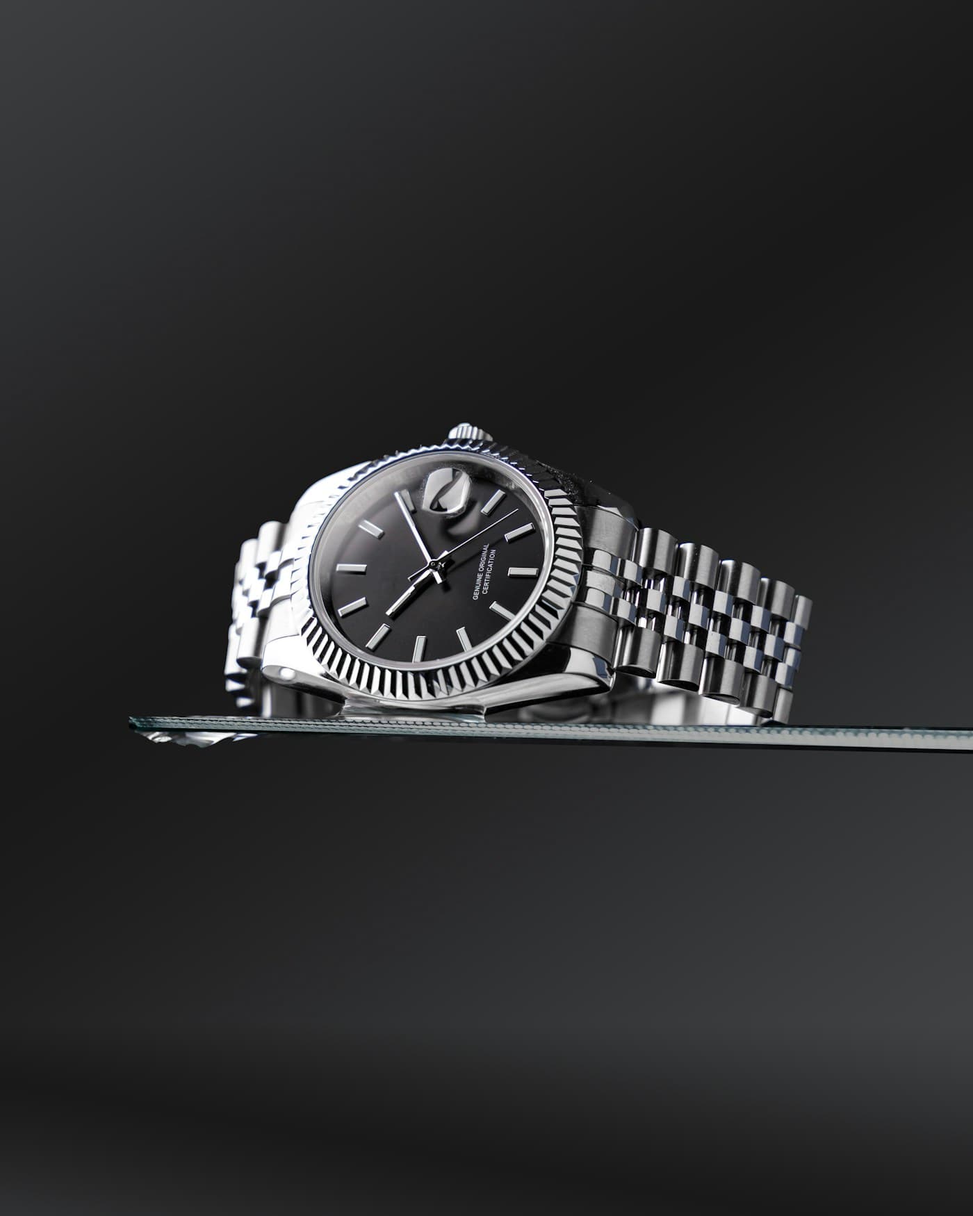 Rolex Datejust with fluted bezel and black dial on Jubilee bracelet